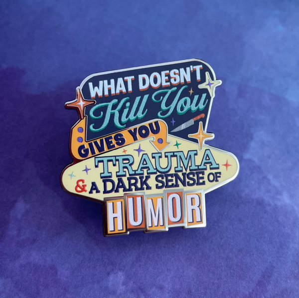 What Doesn't Kill You enamel pin