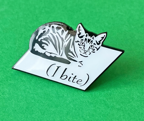 Bite Kitten enamel pin