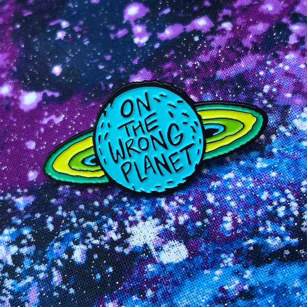 Wrong Planet enamel pin